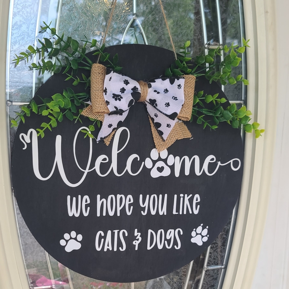Welcome we hope you like dogs cats sign